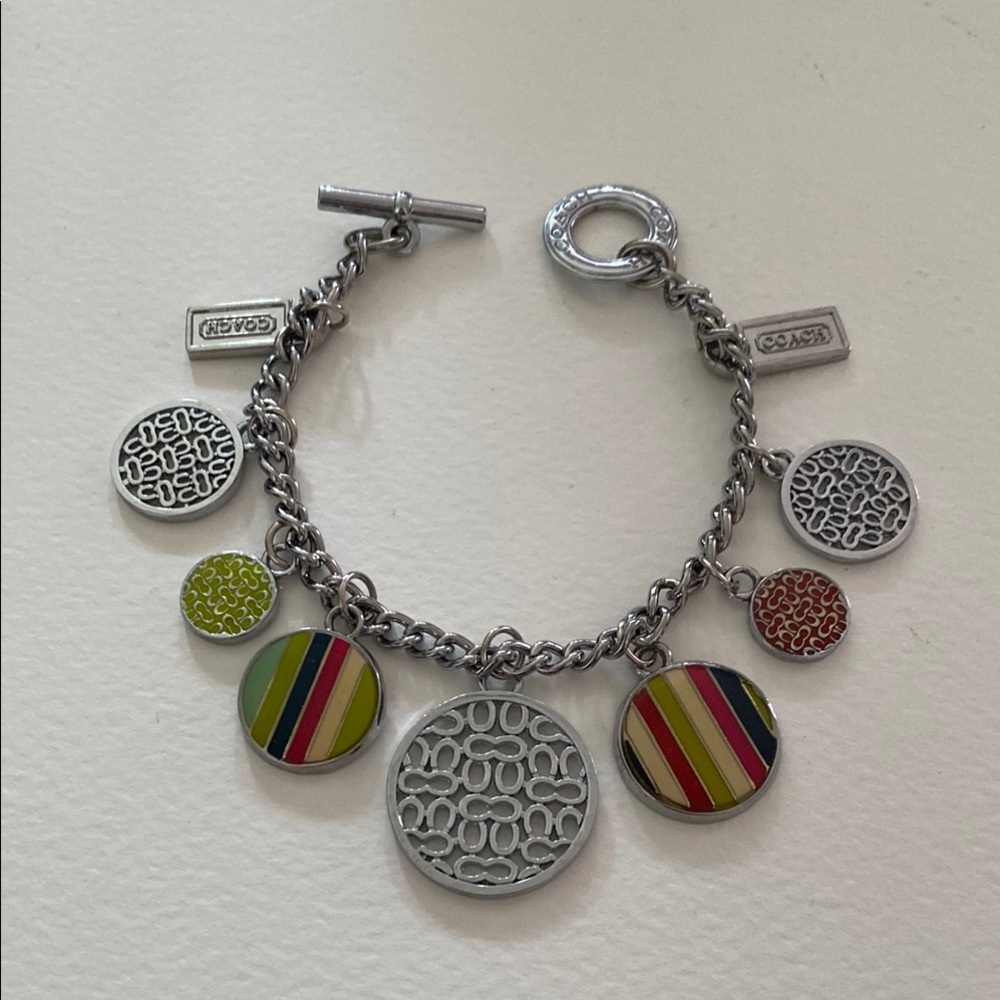Authentic Coach Silver and Green Charm Bracelet with Intricate Details